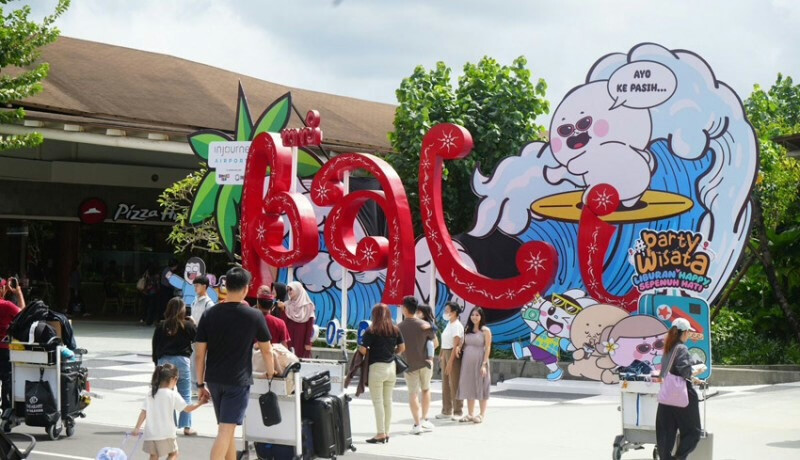 Bali Airport Welcomes Tourists with Beach Setup
