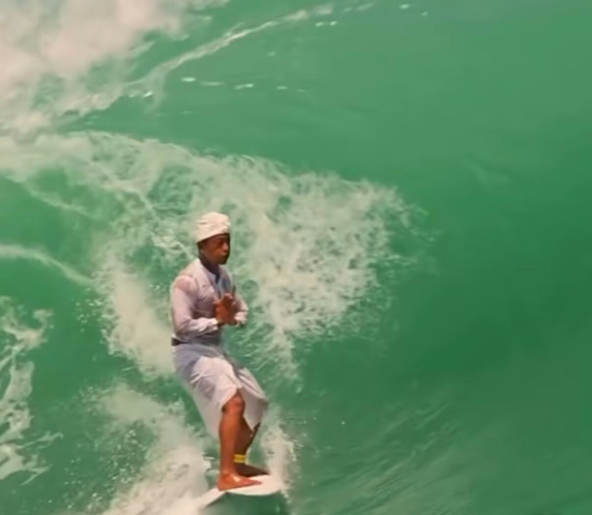 Surfing with Spirit: Religious Rider Stuns Social Media